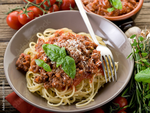 Photo: spaghetti bolognese with ragout sauce and parmesan cheese spaghetti bolognese with ragout sauce and parmesan cheese