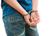 Foto: Young man in handcuffs Young man in handcuffs