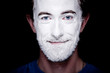 A man with makeup on his face