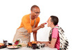 Mixed ethnicity  gay couple kitchen