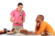 Mixed ethnicity  gay couple kitchen