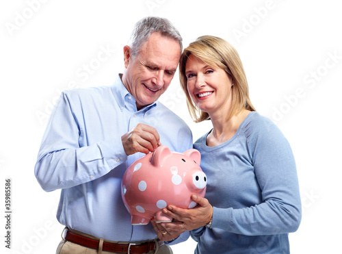Photo: Couple with piggy bank. Couple with piggy bank.