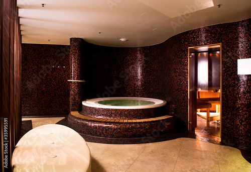 Photo: Modern bathroom interior with jacuzzi and sauna Modern bathroom interior with jacuzzi and sauna