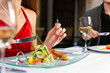 Photo: Couple eating and drinking in very good restaurant Couple eating and drinking in very good restaurant