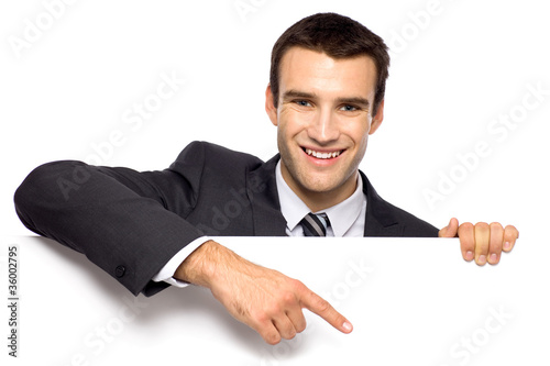 Photo: Businessman pointing finger Businessman pointing finger