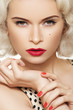 Sexy woman with vintage make-up and hairstyle. Pin-up girl