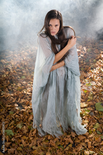 Photo: very Sexy witch in halloween gothic style very Sexy witch in halloween gothic style