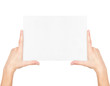 Hands holding paper
