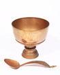 Rice bowl is made of brass.