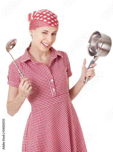 Photo: Playful housewife with ladle and pan Playful housewife with ladle and pan