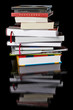 stack of books and CDs, black background
