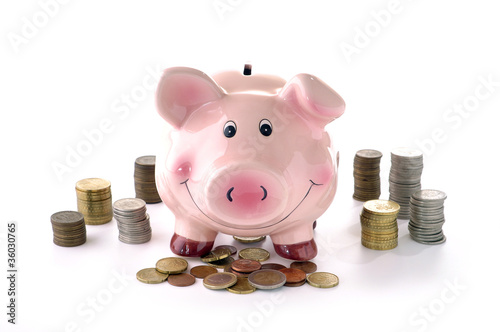 Photo: piggy bank and coins piggy bank and coins