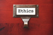 Lustrous Wooden Cabinet with Ethics File Label