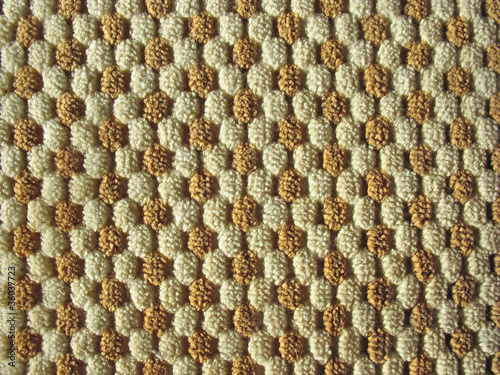 Photo: Brown and white relief plush fabric texture Brown and white relief plush fabric texture