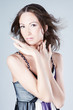 Young asian fashion woman posing in studio