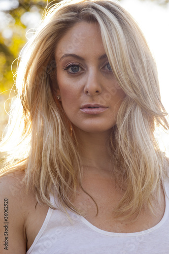 Photo: Backlit Blond in White Top Backlit Blond in White Top