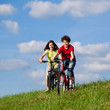 Girl and boy cycling