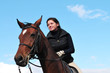 Pretty girl riding horse