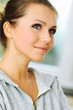 Photo: Beautiful young woman looking away in thoughts Beautiful young woman looking away in thoughts