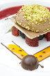 cake with fresh berries, pistachio, strawberry sauce cake with fresh berries, pistachio, strawberry sauce
