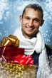 Handsome man with two Christmas gift boxes