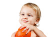 Little boy with a pink grapefruit on a white background