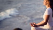 The young woman is practising the yoga. holiday relaxation.