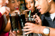 Foto: Friends drinking soda in a bar Friends drinking soda in a bar