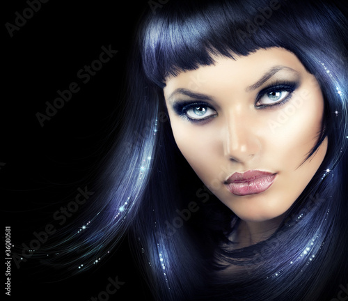 Photo: Beauty Brunette Girl with Magic Hair Beauty Brunette Girl with Magic Hair