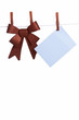 Zettel an einer Weihnachtsschleife