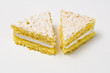 Two triangles of sponge cookies with skimming filling Two triangles of sponge cookies with skimming filling