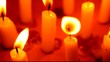 Close up of Candle with red background