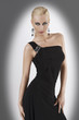 blond girl in black dress with sexy pose