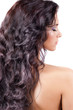 Young woman with long shiny hair isolated
