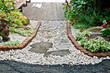 Stone walkway winding in garden Stone walkway winding in garden