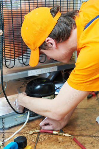 Photo: repair work on fridge appliance repair work on fridge appliance