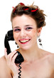 Foto: Happy smiling young female on phone isolated Happy smiling young female on phone isolated