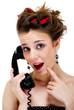 Foto: Pretty female with phone and look of suprise Pretty female with phone and look of suprise