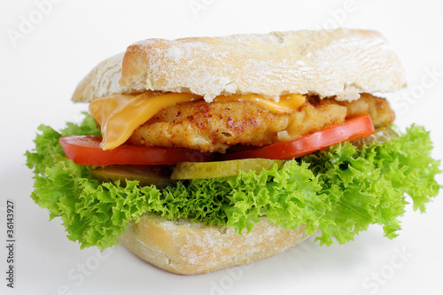 Photo: Brötchen mit Schnitzel, Salat und Tomaten Brötchen mit Schnitzel, Salat und Tomaten