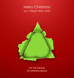 Torn paper in the shape of Christmas tree.
