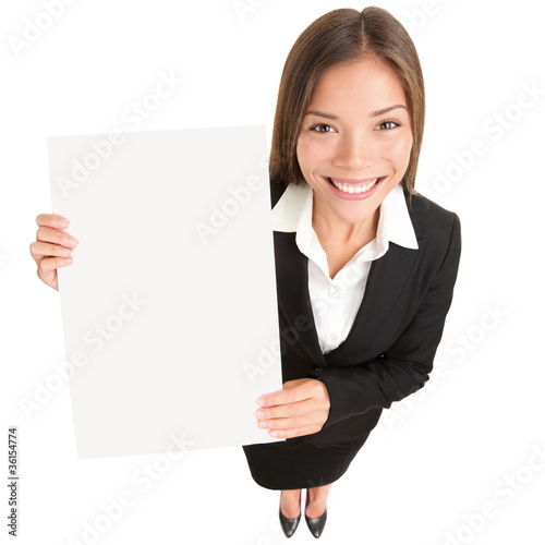 Photo: Business woman showing sign Business woman showing sign