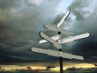 Image of blank signpost over dramatic sky