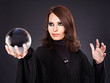 Young woman with crystal ball.