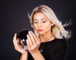 Young woman with crystal ball.