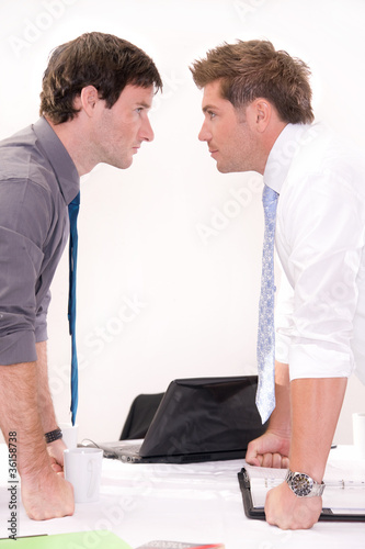 Photo: Rivalry between two workers Rivalry between two workers