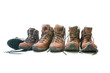 Three pairs of hiking boots. Concept for family hiking
