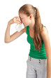 Woman with handkerchief sneezing