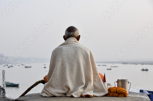 Photo: Sadhu praying at the ghats in Varanasi Sadhu praying at the ghats in Varanasi