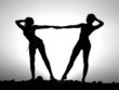 Silhouette of two young women Silhouette of two young women