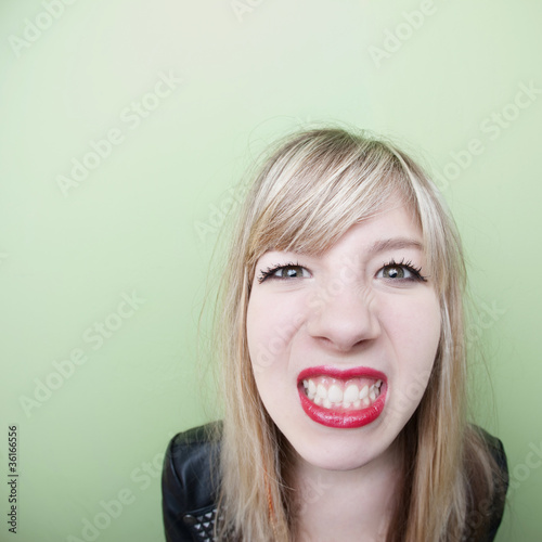 Photo: Girl Clenches Teeth Girl Clenches Teeth